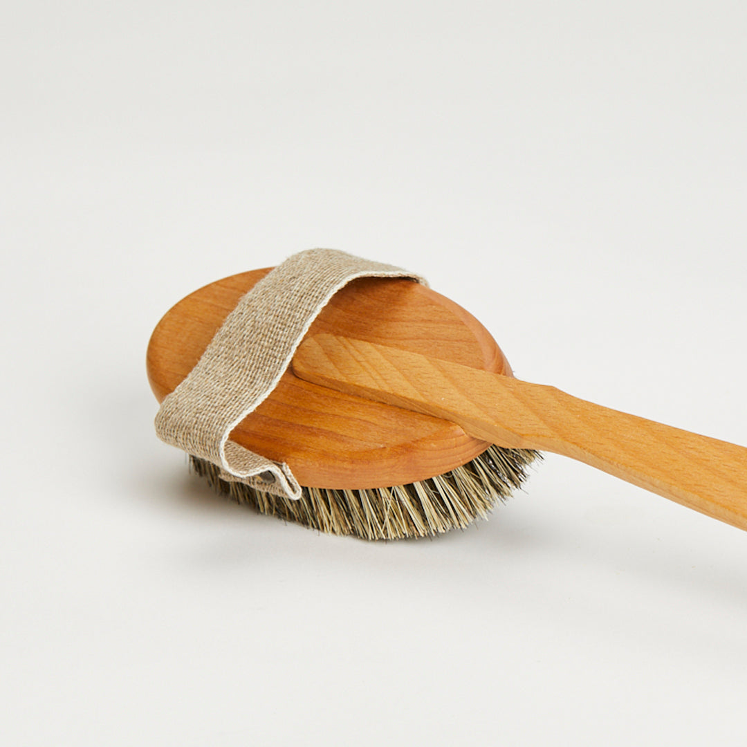 Kroppsborste med avtagbart handtag