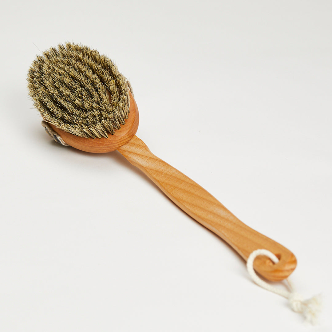 Kroppsborste med avtagbart handtag