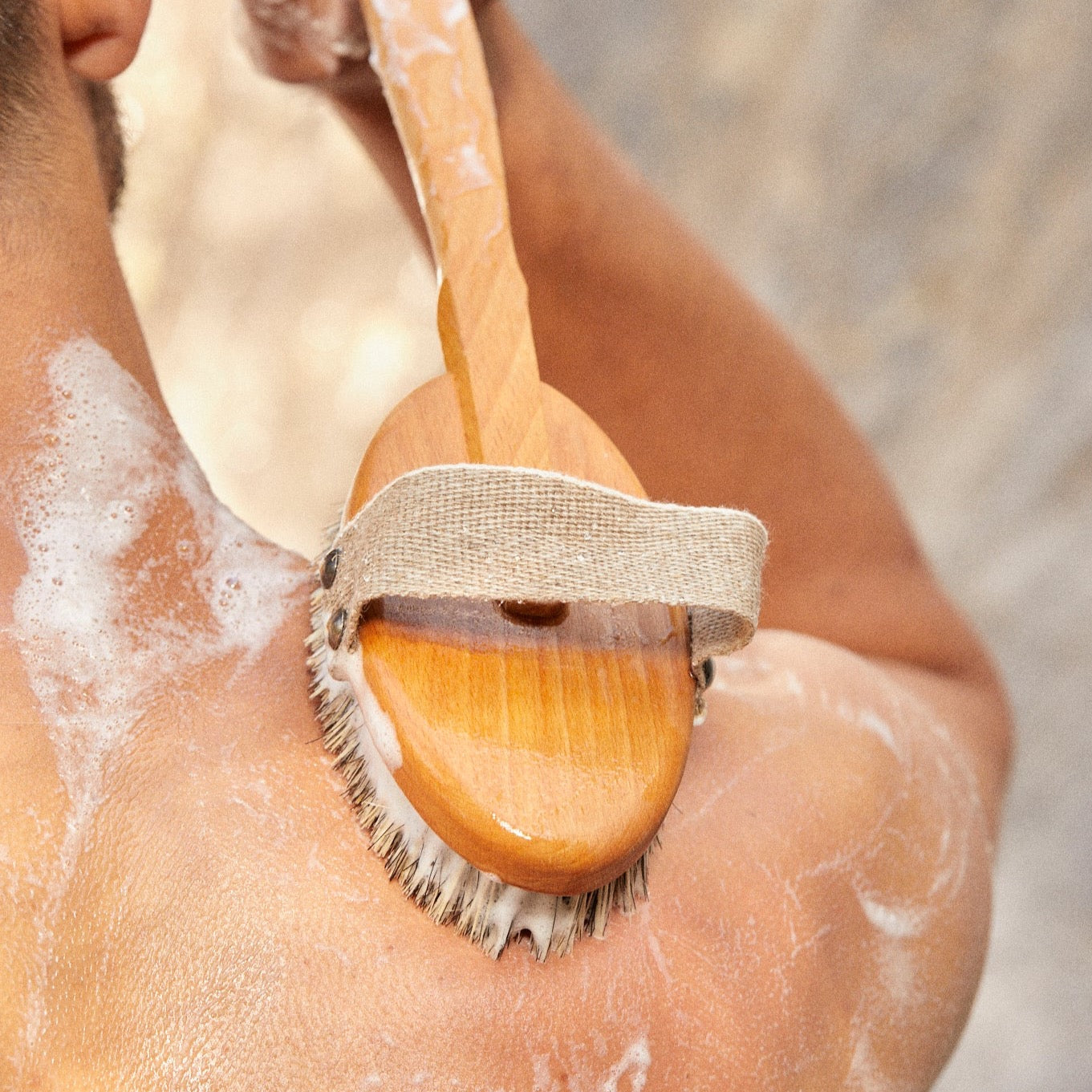 Kroppsborste med avtagbart handtag